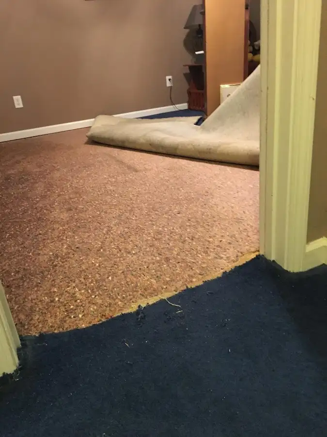 Carpet pad removal revealing water damage during Drying & Dehumidification in Lemoore